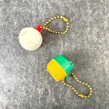 Coin holder key chains - hard plastic - 1970s 