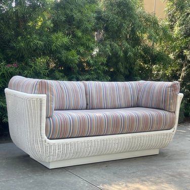 Rattan 1970s Loveseat | white with multicolor striped upholstery | vintage sofa | Eclectic Seating for sunroom, patio 