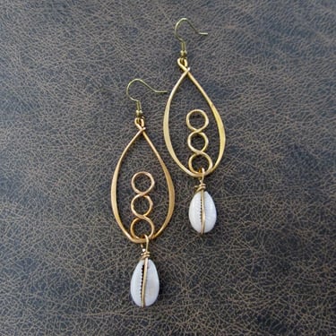 Hammered brass and cowrie shell hoop earrings 