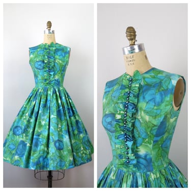 Vintage 1960s floral dress cotton fit and flare green sleeveless sundress ruffle front full skirt 