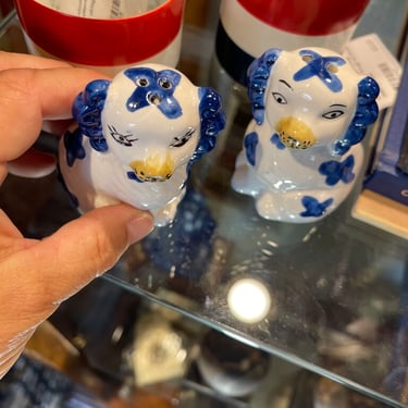 Pair of blue and white staffordshire dog salt and pepper