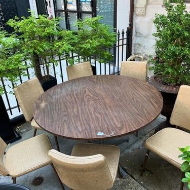 Big dining set for a big gathering. Includes six vinyl chairs and one big laminate table. Diameter 47.5” Chairs 32”x16.5” 