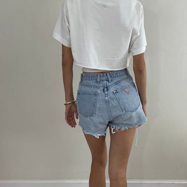 vintage 90s Guess jean cutoff shorts faded denim designer cut off shorts made USA size 27