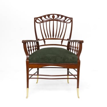 English Aesthetic Movement,  Mahogany armchair with suede seat.
