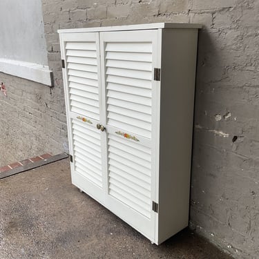 Vintage Louvered Door Cabinet