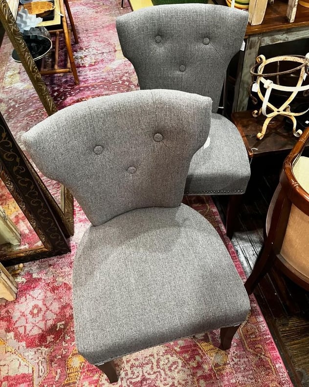 Gray upholstered side chairs, 2 available. 23” x 21” x 37” seat height 19” 