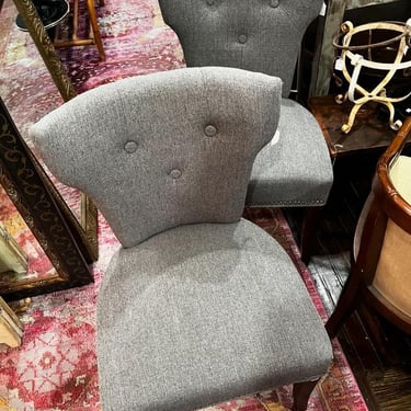 Gray upholstered side chairs, 2 available. 23” x 21” x 37” seat height 19” 