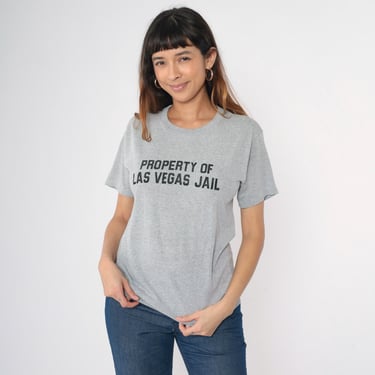 Vintage 80s Property of Las Vegas Jail T-Shirt Gray Graphic Crewneck Retro 50/50 Cotton Blend Prison Theme Tee Funny Joke Small Medium 