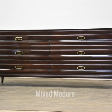 Tommi Parzinger 73” Mahogany and Brass Dresser 