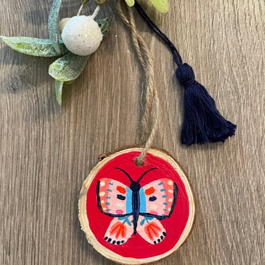 Folk Art Butterfly Ornament/Red, Pink and Blue Boho Christmas Decoration with Tassel/ Hand Painted Wood Slice Holiday Tree Decor 