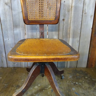 Antique Swiveling and Rolling desk chair