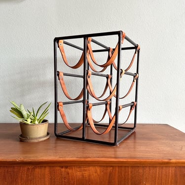 1970s Arthur Umanoff 6-bottle wine rack / vintage MCM brutalist iron and leather wine storage 