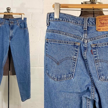 Vintage Levi's 550 Distressed Light Wash Women's Jeans Relaxed Fit Tapered Leg USA Made Waist 30" Inseam 31" Size 11 1990s 