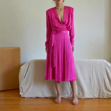 hot pink satin checkerboard wrap dress with pleated skirt and plunging neckline 