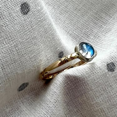 Moonstone in Silver on a vintage up cycled 14k gold engraved wedding band by Rachel pfeffer 