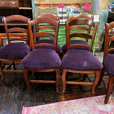 Purple velvet chairs,  6 available. 