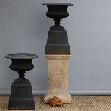 Pair of Cast Iron Urns on Stands
