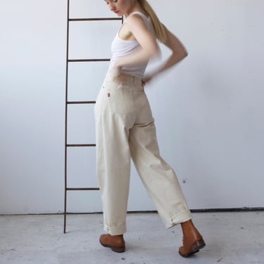 cream colored high waisted button fly jeans 