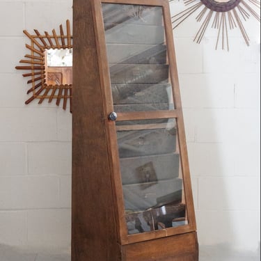 vintage glass front multidrawer cabinet