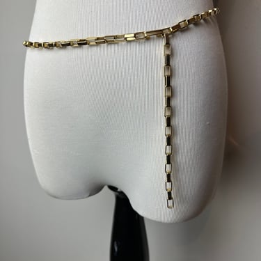 Vintage Gold slinky metal belt Mesh chain link waist chain glossy bright golden shiny skinny thin belts 1960’s 1970’s  size LG 33” waist/hip 