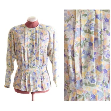 Long sleeve floral blouse with defined waist and pleats 