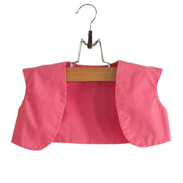 Vintage child's pink vest 