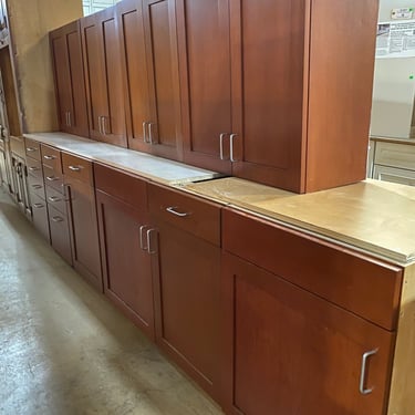 10 Piece Set of Cherry Stained Kitchen Cabinets