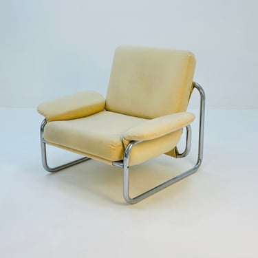 Mid century   tubular frame armchair 