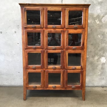 Vintage Mercantile Twelve Drawer With Glass Front Drawers Cabinet