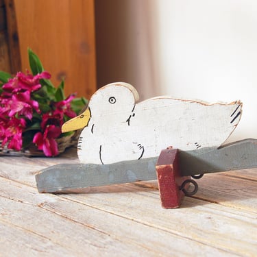 Antique wooden folk art duck / vintage wood toy / primitive folk art toy / vintage painted wood duck / wood door stop block 