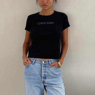 90s Calvin Klein tee / vintage black cotton Calvin Klein Jeans spell out cropped t shirt tee | Medium 