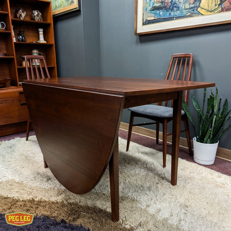 Mid Century  walnut drop-leaf dining table by Jack Cartwright  for Founders