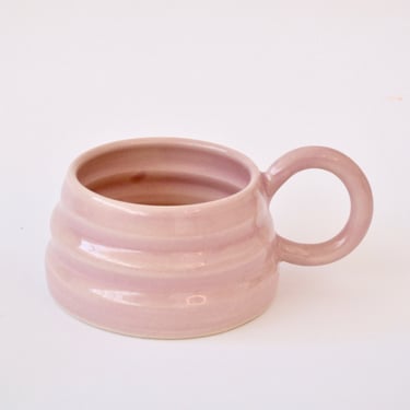 Lilac handmade ceramic mug with wiggly ripple shape 