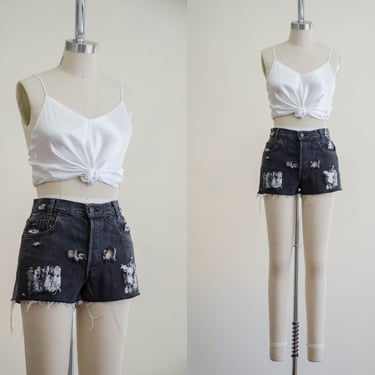 black cut off shorts | 90s vintage Levi's 701 student fit cheeky distressed destroyed ripped booty shorts 