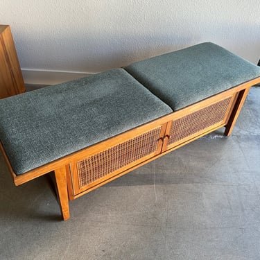 Walnut storage bench with upholstered seat