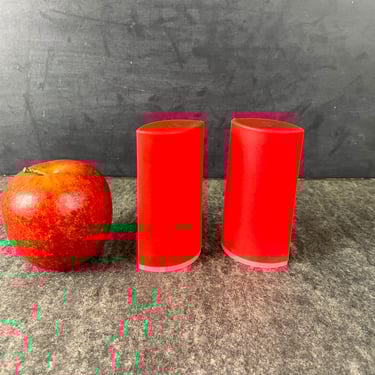 Neon coral pink plastic salt and pepper shakers - 1980s vintage 