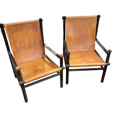 Pair of French midcentury modern chairs. Black frames with leather.