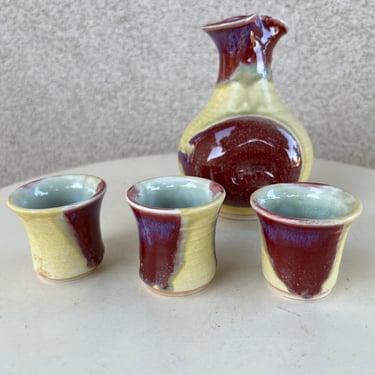 Vintage studio pottery art sake set with 3 cups yellow burgundy colors signed 