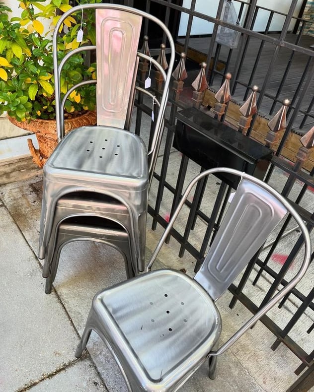 Gray metal chairs. Stackable too! 8 available. 15” x14.5” x 32.5” seat height 17.5” 