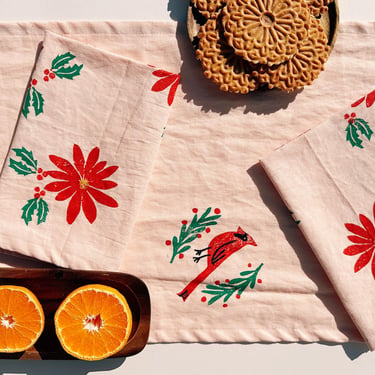 poinsettias on blush. block printed linen napkins / placemats / tea towels. set of four. boho christmas party. holiday decor. snow. winter. 