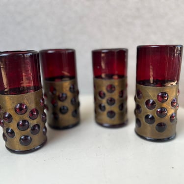 Vintage brutalist barware tall tumblers set 4 caged cranberry glass with brass Mexico 