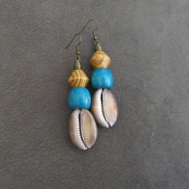 Cowrie shell earrings, long wooden earrings, African Afrocentric earrings, seashell earrings, exotic ethnic earrings, turquoise earrings 