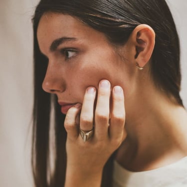 Uni jewelry Crescent Studs - Bronze  on Garmentory