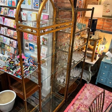 Big gold metal arch top etagere. 5 shelves. 30.5” x 14.5” x 82” 