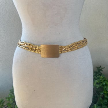 Vintage gold tone belt multi stands fits 30” by Christian Dior. Twisted style chain 