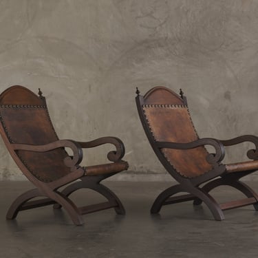 PAIR OF BUTAQUE ARM CHAIRS, MID 20TH C