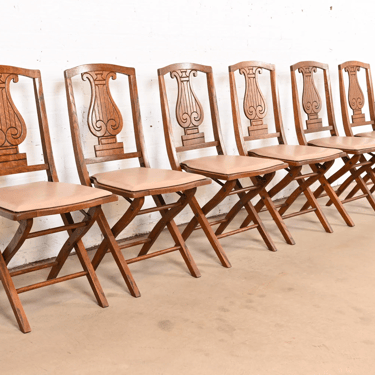 Antique Arts & Crafts Carved Oak Lyre Back Folding Dining Chairs by Phoenix Chair Co., Set of Six