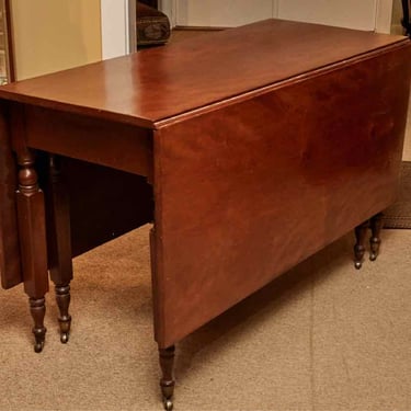 Antique Cherry Drop Leaf With Turned Legs On Casters Dining Table