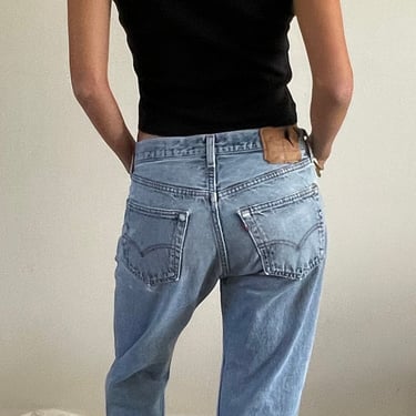 31 Levis 501 vintage faded jeans / vintage light wash faded frayed torn holes button fly boyfriend high waisted Levis 501-0115 jeans USA 31 