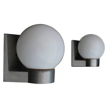 Sexy and rare pair of 1960's outdoor sconces